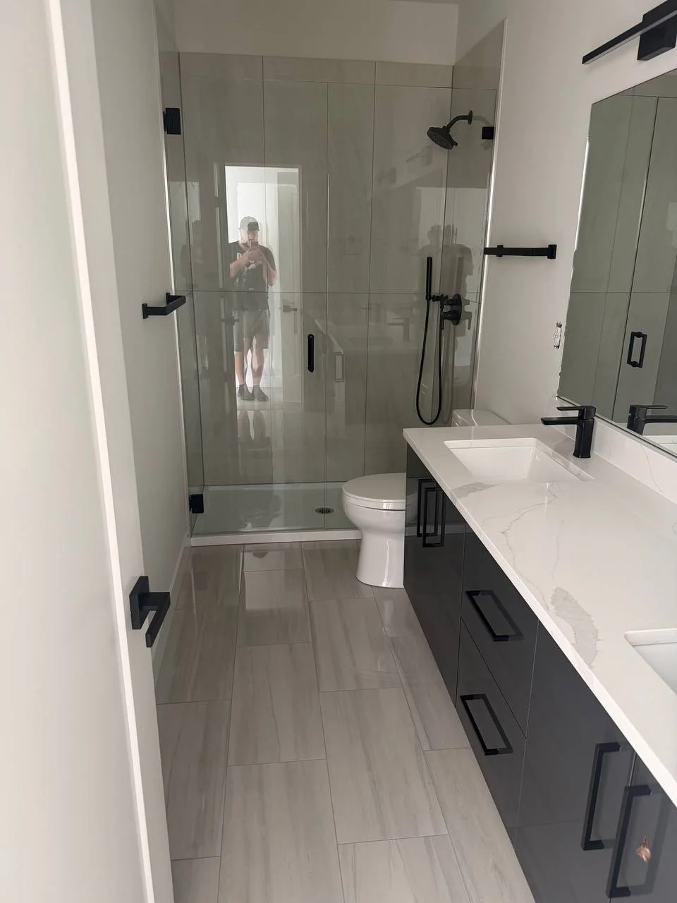 Modern bathroom with tile and warm finishes
