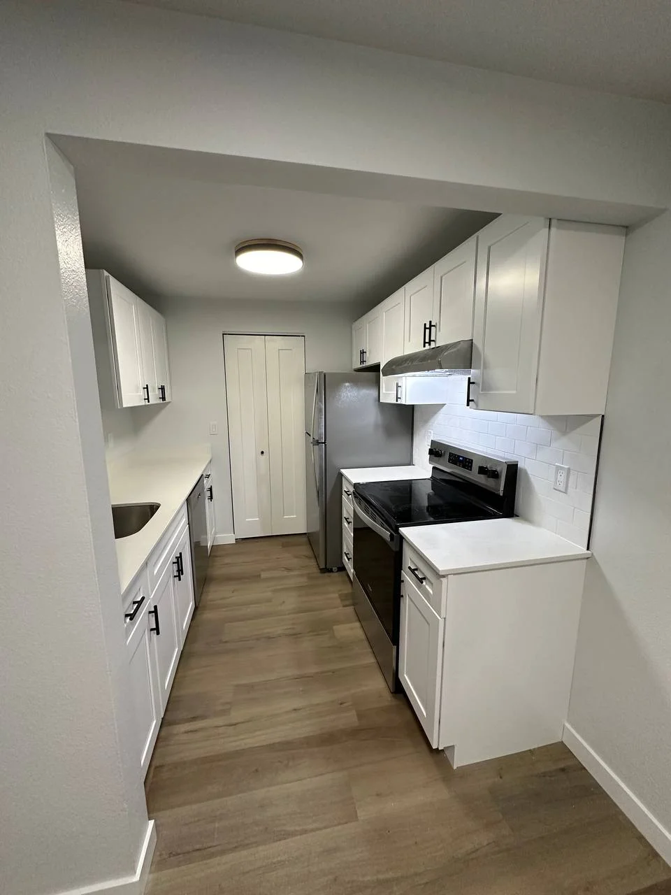 Warm remodeled kitchen and living space